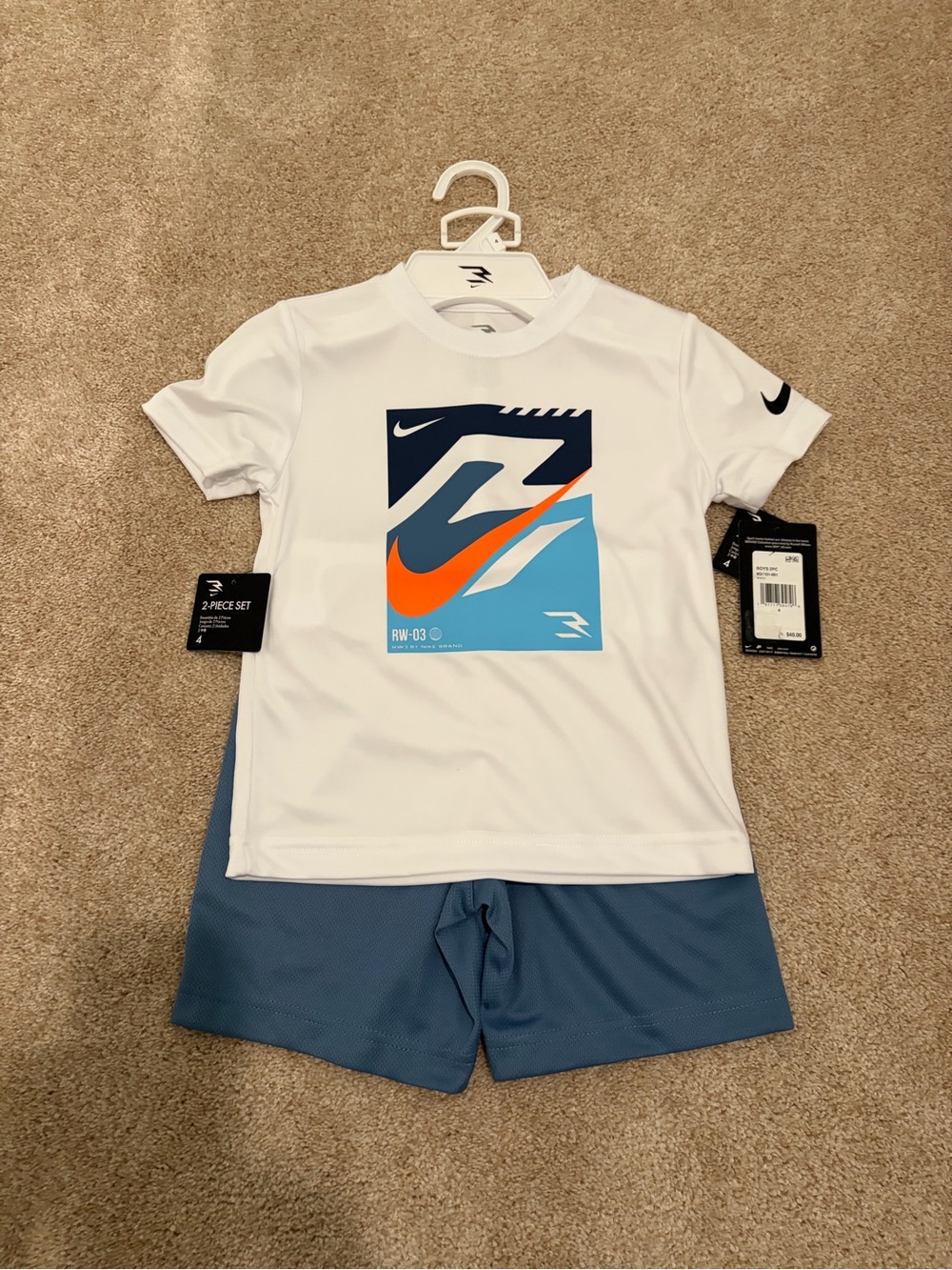 Nike Kids White Rash Guard & Blue Swim Shorts with Orange Accent